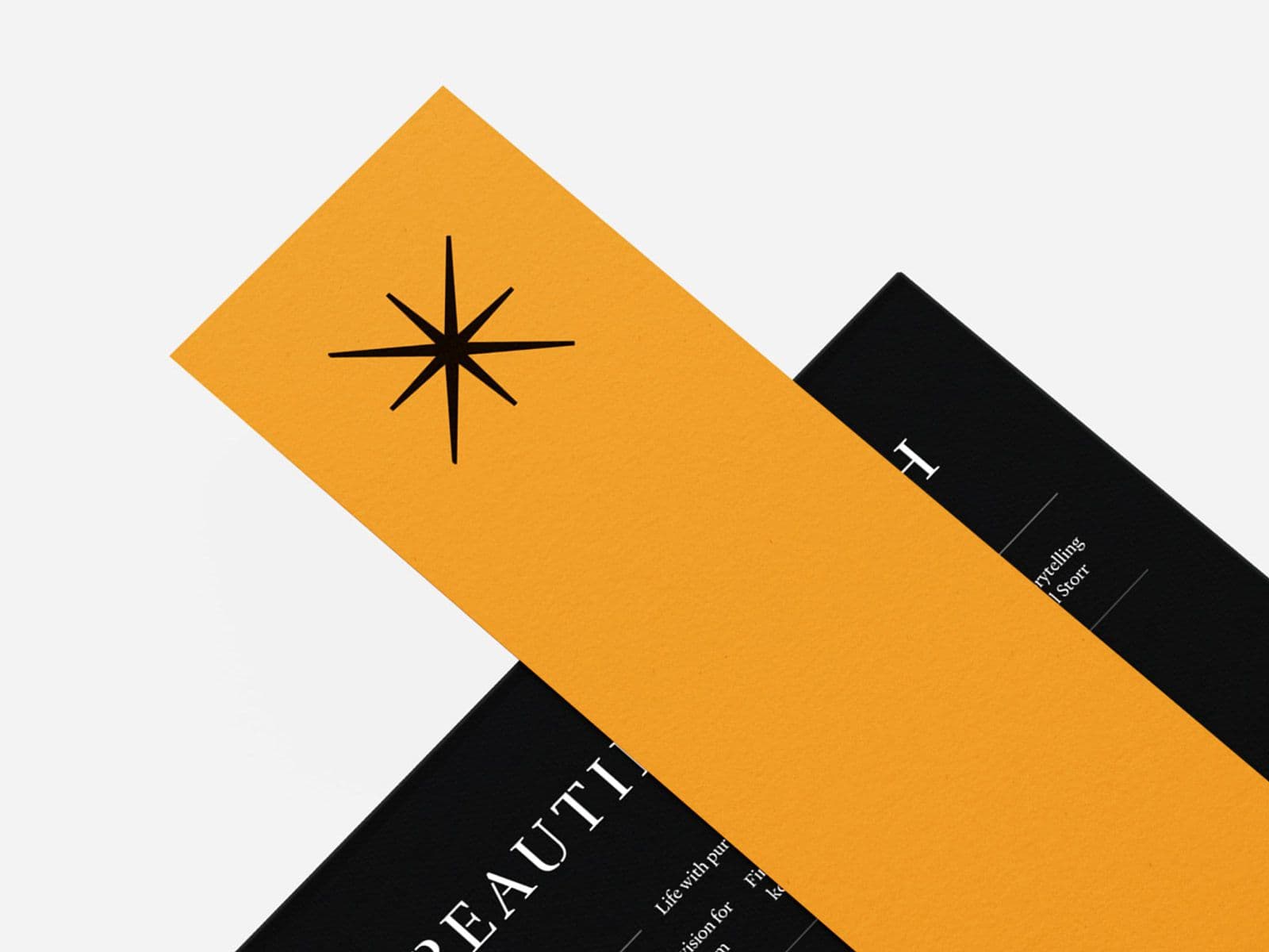Branded bookmark and magazine for The Beautiful Truth, design by Extract Studio