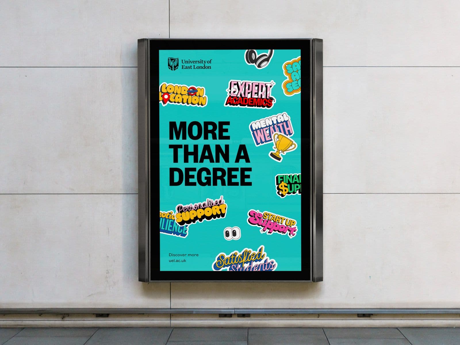 Bright, colourful out of home advertising poster for University of East London. Design by Extract Studio features illustrative stickers that cover the advert in an expressive way